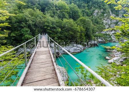Wooden Bridge over rover Soca, Slovenia in Julian Alps
