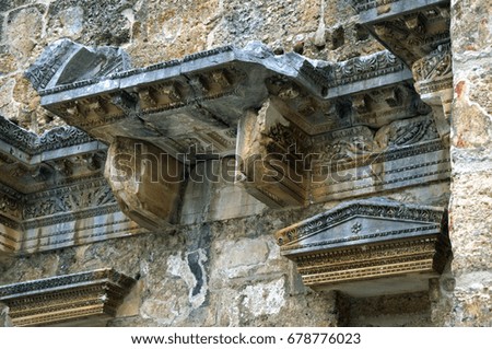 Ancient design on the remains of the Greek amphitheater in Turkey