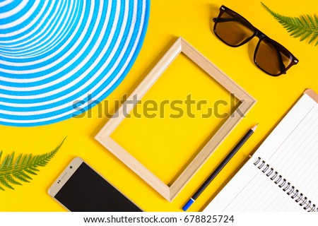 Wooden picture frame and set object vacation relax on colorful paper with travel and fashion style