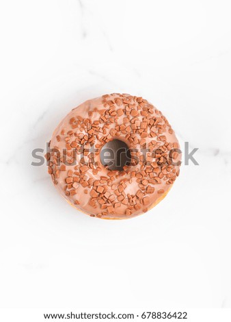Chocolate Donut on white marble background