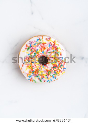 Donut on white marble background