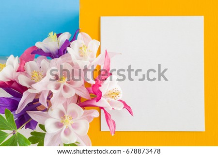 White blank greeting card with flowers. Empty place for a text.