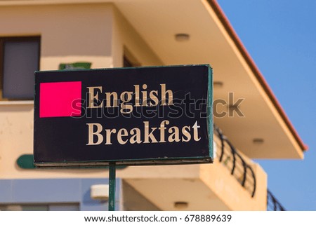English Breakfast signboard on the street