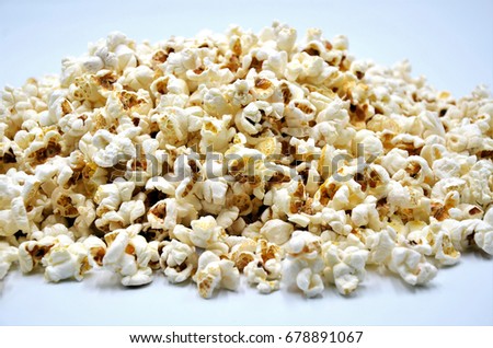 a lots of popcorn on one photo close up