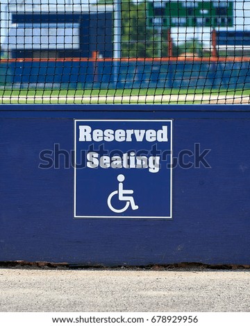 Handicapped reserve seating sign at ball field