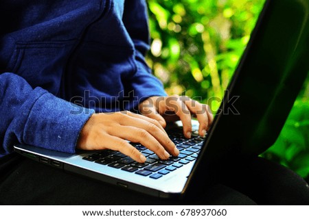 Business woman using laptop computer.