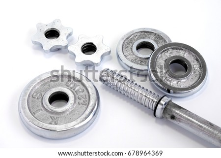 Weight plate and Dumbbell handle of Adjustable Dumbbell for home gym on isolate white background.