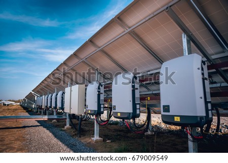 Back view of solar panel. Inverter to transform direct current into alternate Royalty-Free Stock Photo #679009549
