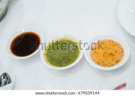Spicy sauce seafood and Sweet chilli sauce(chinese plum sauce) and Soy Sauce.These three dipping sauces Has a spicy taste and sweetness and saltyness.