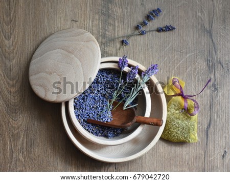 Lavender flower in wooden bowl on a table