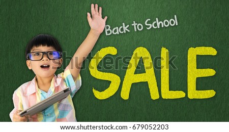 boy holding tablet raise his hand up for Back to School sale