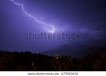 a storm with lightning over mountains in Dilijan, Armenia