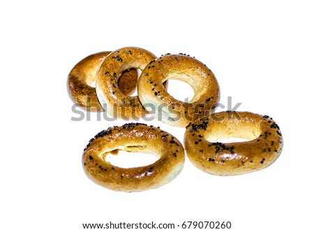 Bagels with poppy seeds on a white background