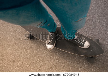 Skateboarding, legs, longboard and asphalt