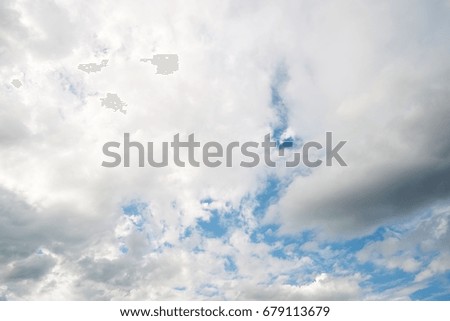 Bright blue and clouds as background.