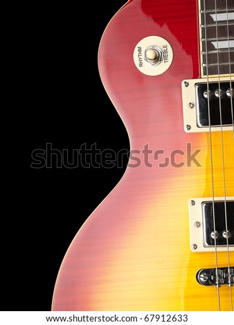electric guitar body,closeup over black background, for music and entertainment themes