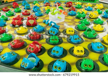 Plastic Frogs in a Pond Fair, Carnival, Amusement Park Children's Game