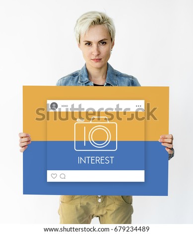 People holding placard with camera icon