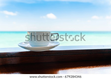 Coffee cup with Beautiful tropical Maldives island  ( Filtered image processed vintage effect. )