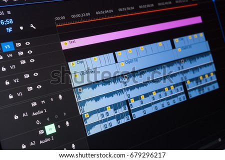 Video editing time line on computer screen Royalty-Free Stock Photo #679296217