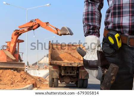 Laborers working on road construction