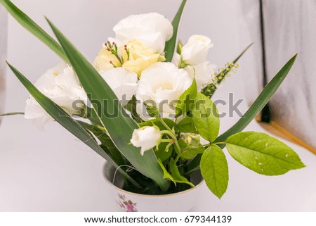 floral arrangement with white roses
