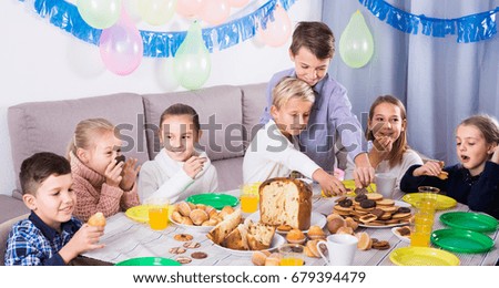 children having good time during friends birthday party 