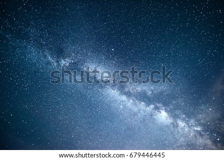 Vibrant night sky with stars and nebula and galaxy. Deep sky astrophoto. Royalty-Free Stock Photo #679446445