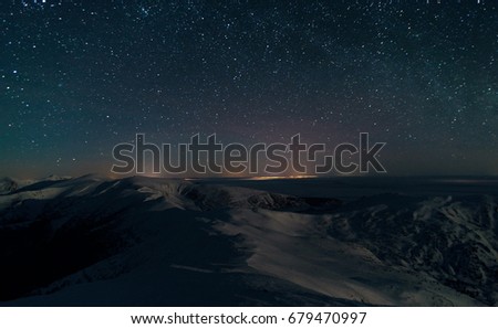 Amazing Panoramic Landscape view of a Milky Way at night sky, with grain