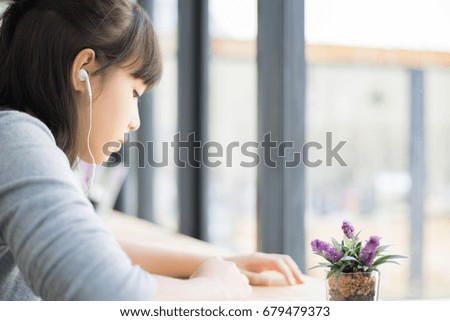 happy woman relax listening music with her headphones, relax concept