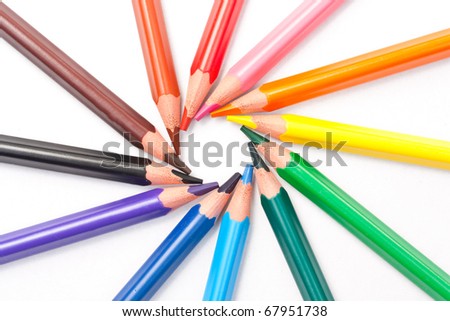 Triangular color pencils circle isolated on white background.