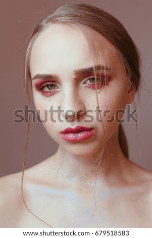 Beauty portrait of a beautiful girl with beautiful make-up