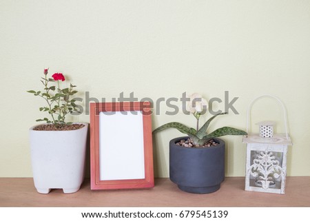 mock up frame photo  on wooden shelf. home decoration