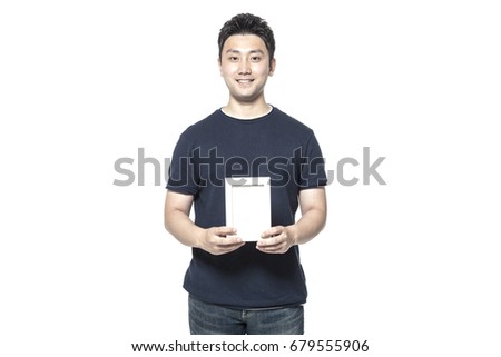 A man hand hold a blank(empty) photo frame isolated white.