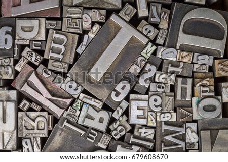background of vintage letterpress metal type printing blocks