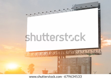 Blank white billboard and sunset in the evening - can advertisement for display or montage product and business
