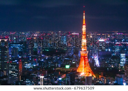 Tokyo Tower, Tokyo among skyscrapers at Night