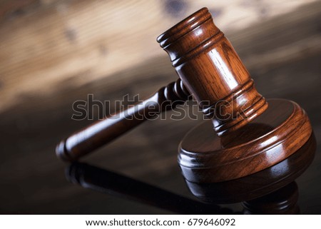 Gavel. Wooden background. Place for text.