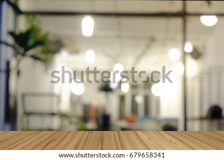 empty brown board wooden perspective with light bokeh blued background can be used  for montage mock up display of product.