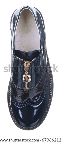 Upper view of black and brown varnished leather male summer boot (low shoe) with shirr and gilding metal zipper, isolated on white (FOCUS ON INSOLE)