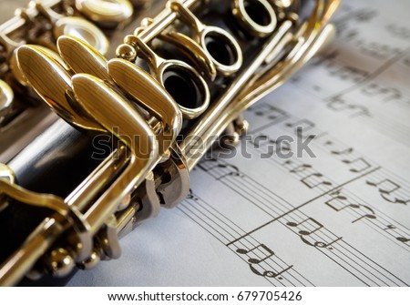 clarinet with sheet music,close shot of clarinet with sheet music