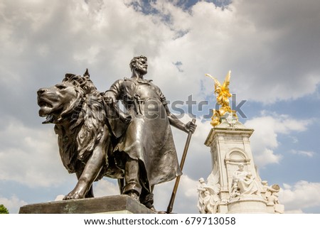 A statue on the fountain outside of Buckingham Palace in London, England