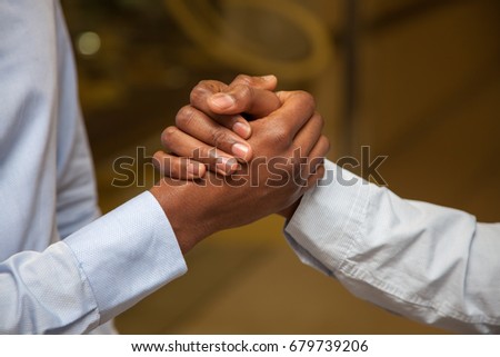 Businessmen shake hands  Royalty-Free Stock Photo #679739206