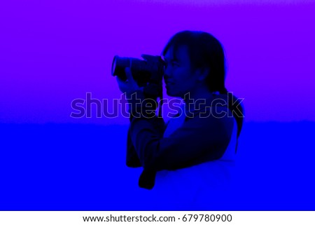 Female photographers are taking photos.