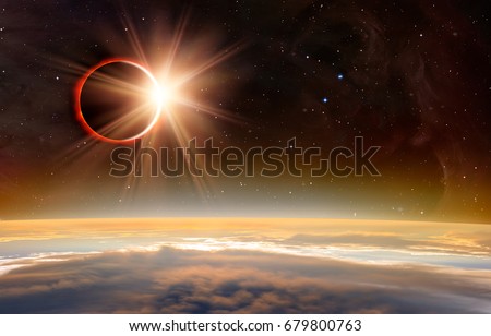 Solar Eclipse over the planet Earth "Elements of this image furnished by NASA" Royalty-Free Stock Photo #679800763