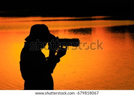 Silhouette of a Photographer