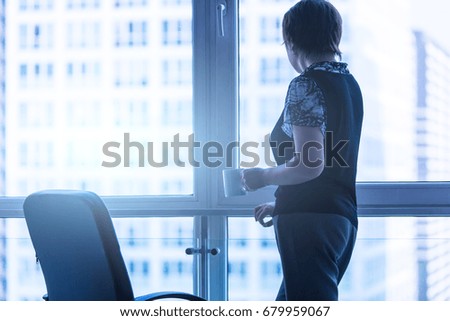 Modern business woman in the office with copy space,Focus outside the blurred background