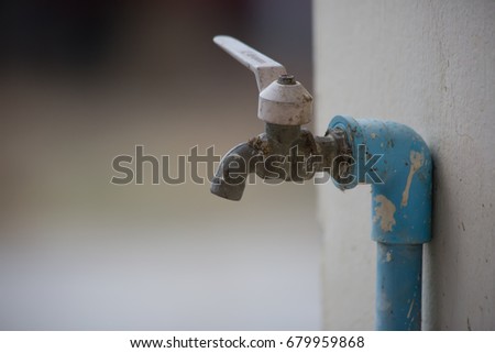 Old faucet in the house Royalty-Free Stock Photo #679959868