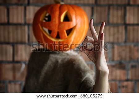 pumpkin head monster sign hand space halloween