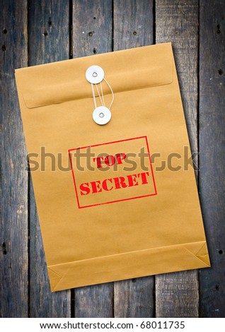 Top Secret package on wood